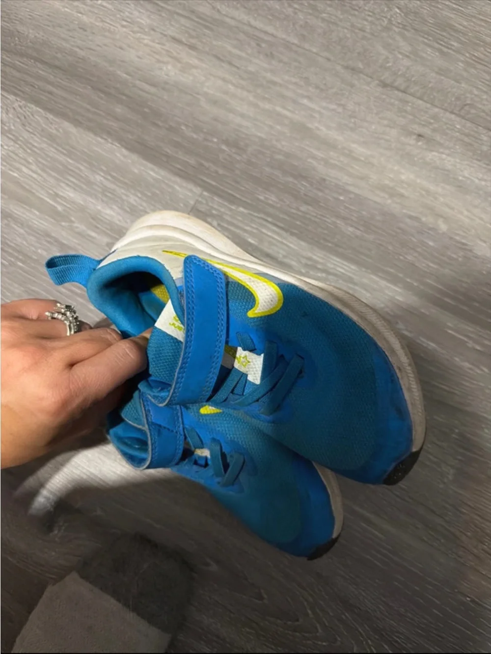 Nike Kids Blue Sneakers with Yellow Swoosh